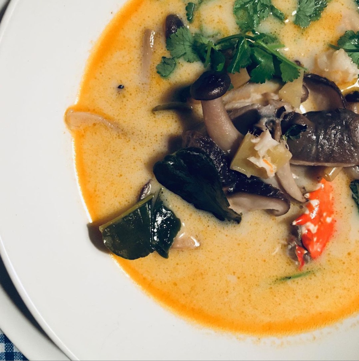 a bowl with a coconut thai soup