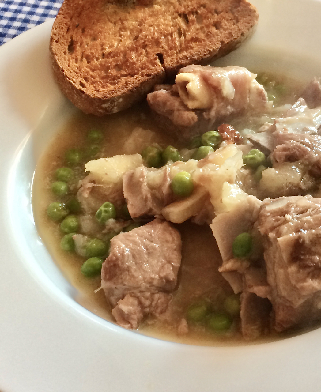 a plate of lamb portuguese soup