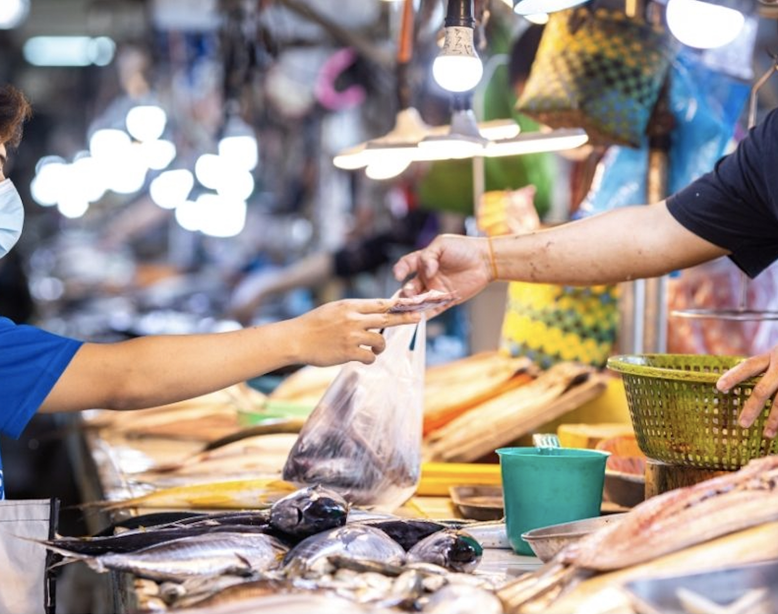 a person cooking food on a grill