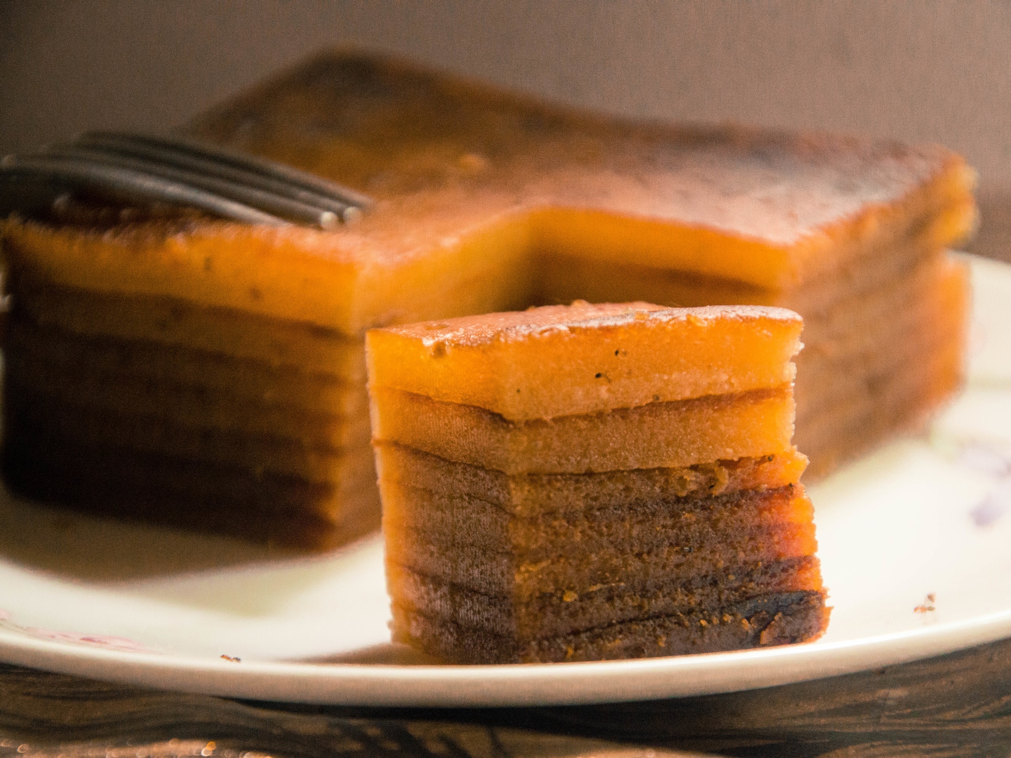 a close up of a slice of cake on a plate