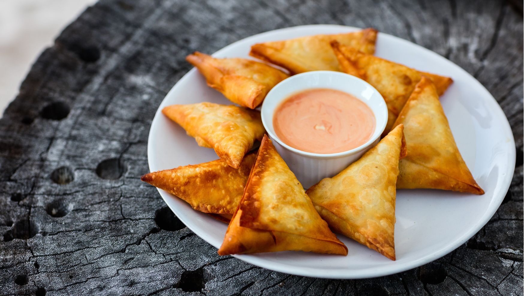 a plate of food with a slice cut out