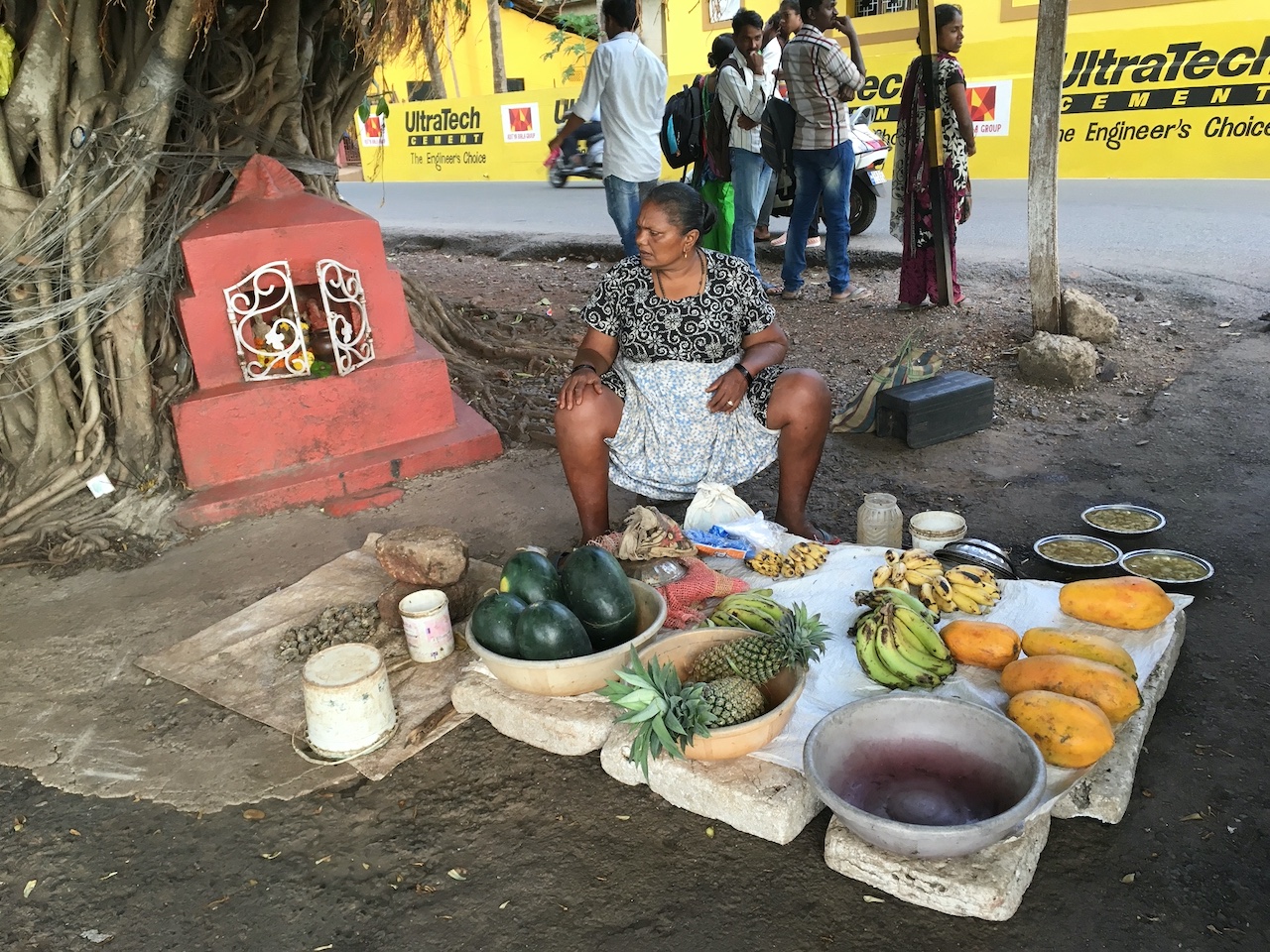 a person sitting at a picnic table